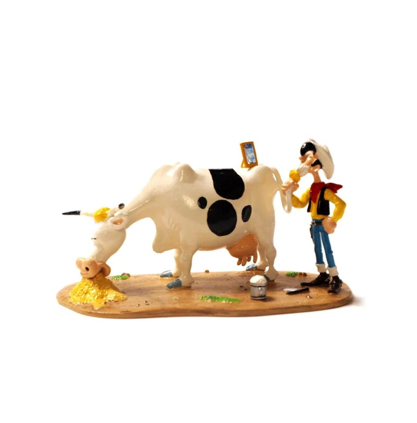Pixi Morris Lucky Luke - Lucky Luke se rasant avec la queue de la vache