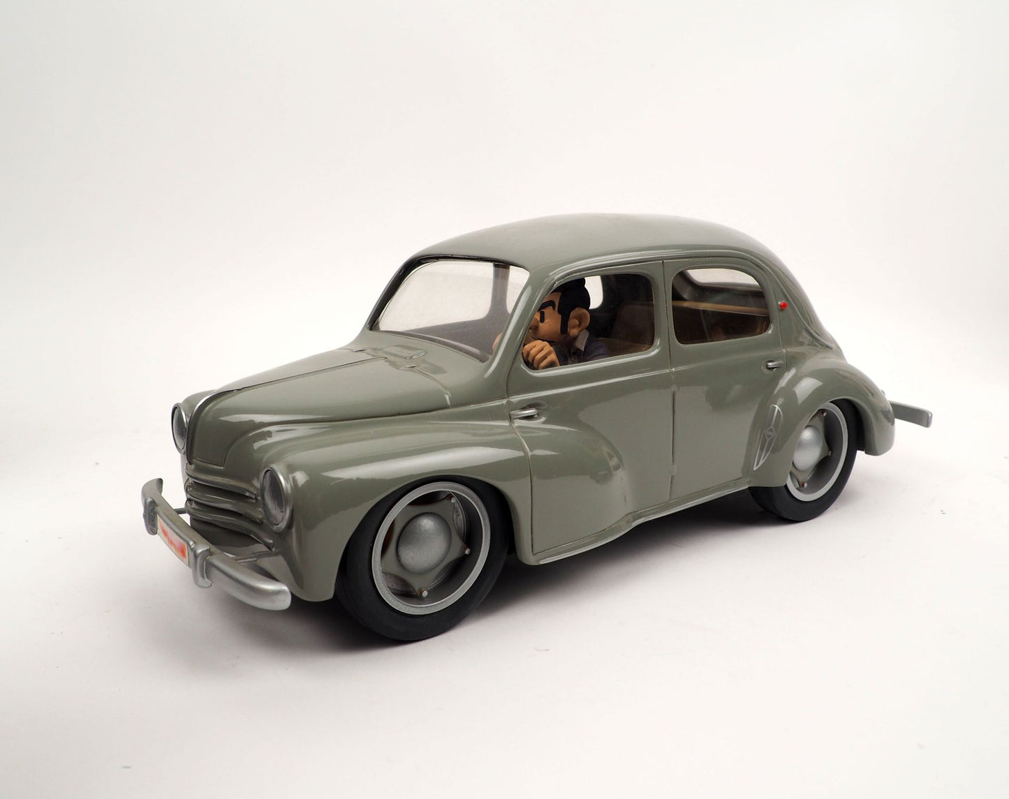 Aroutcheff - Spirou et Fantasio - Renault 4CV avec Spirou derrière
